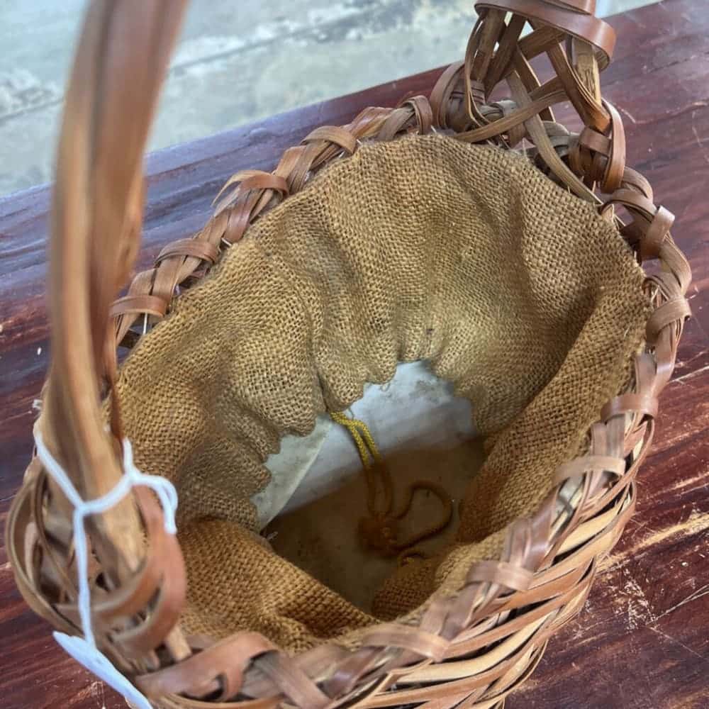 OLD TATTERED REED DRAWSTRING BASKET AS IS