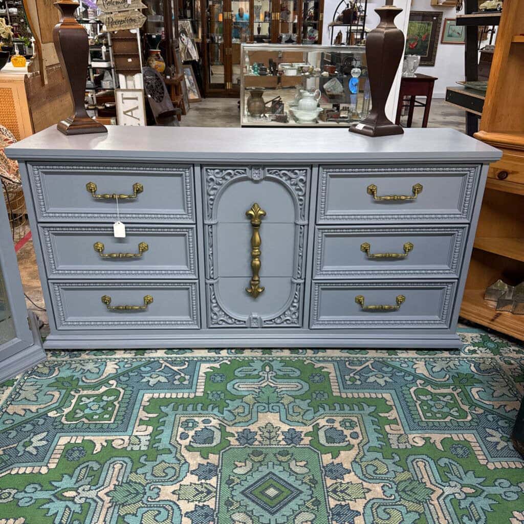 GREY BASSET 9 DRAWER WOODEN DRESSER