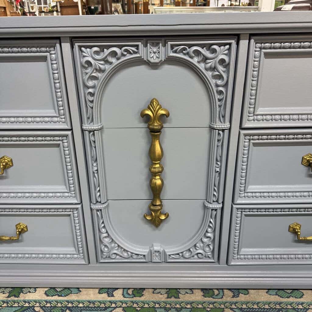 GREY BASSET 9 DRAWER WOODEN DRESSER