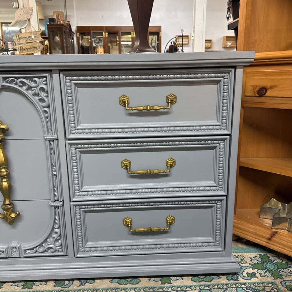 GREY BASSET 9 DRAWER WOODEN DRESSER
