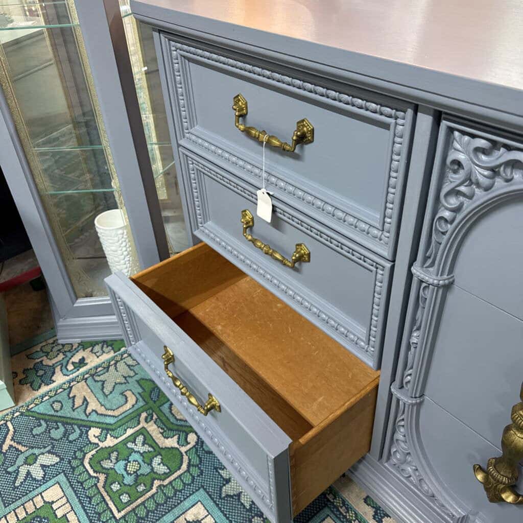 GREY BASSET 9 DRAWER WOODEN DRESSER