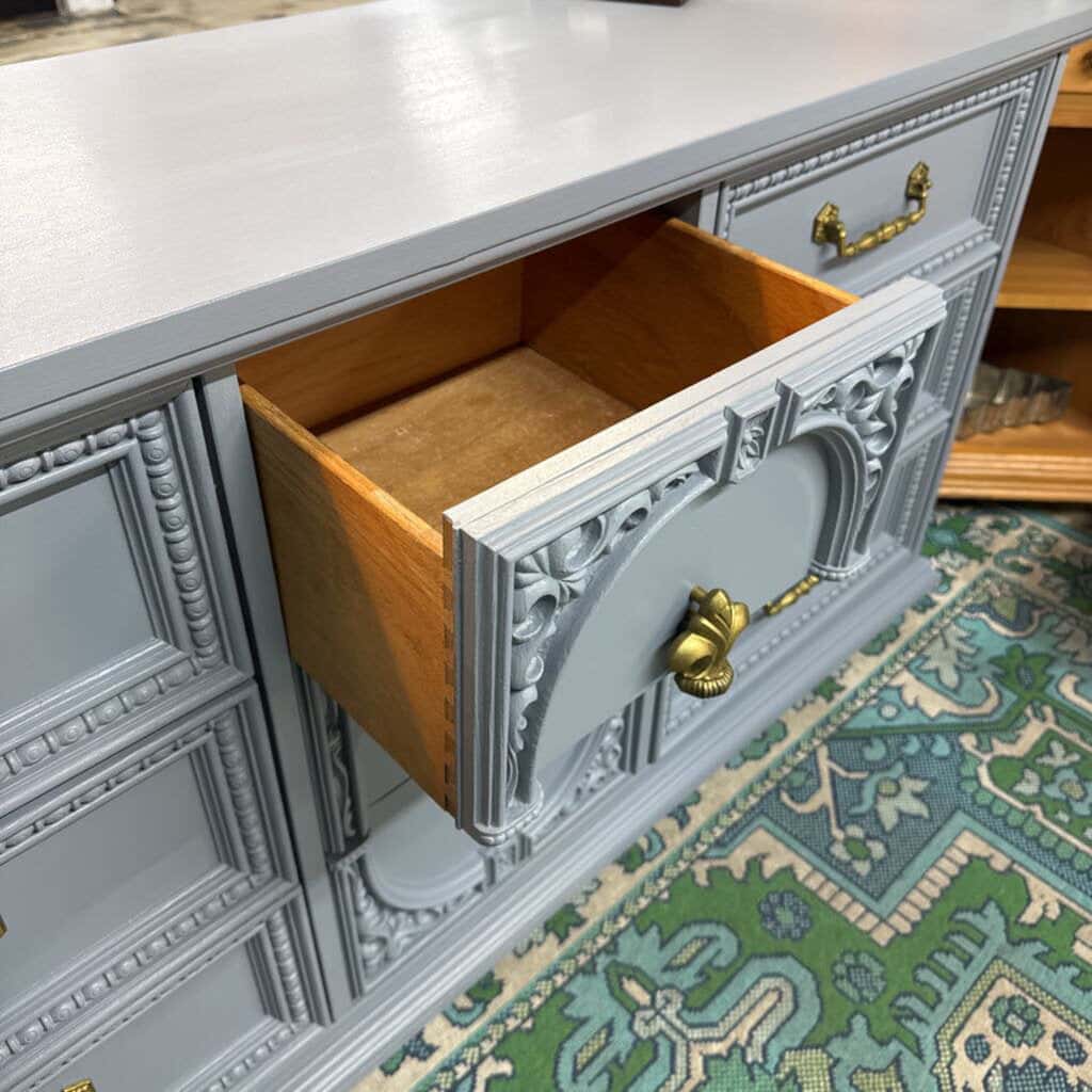 GREY BASSET 9 DRAWER WOODEN DRESSER