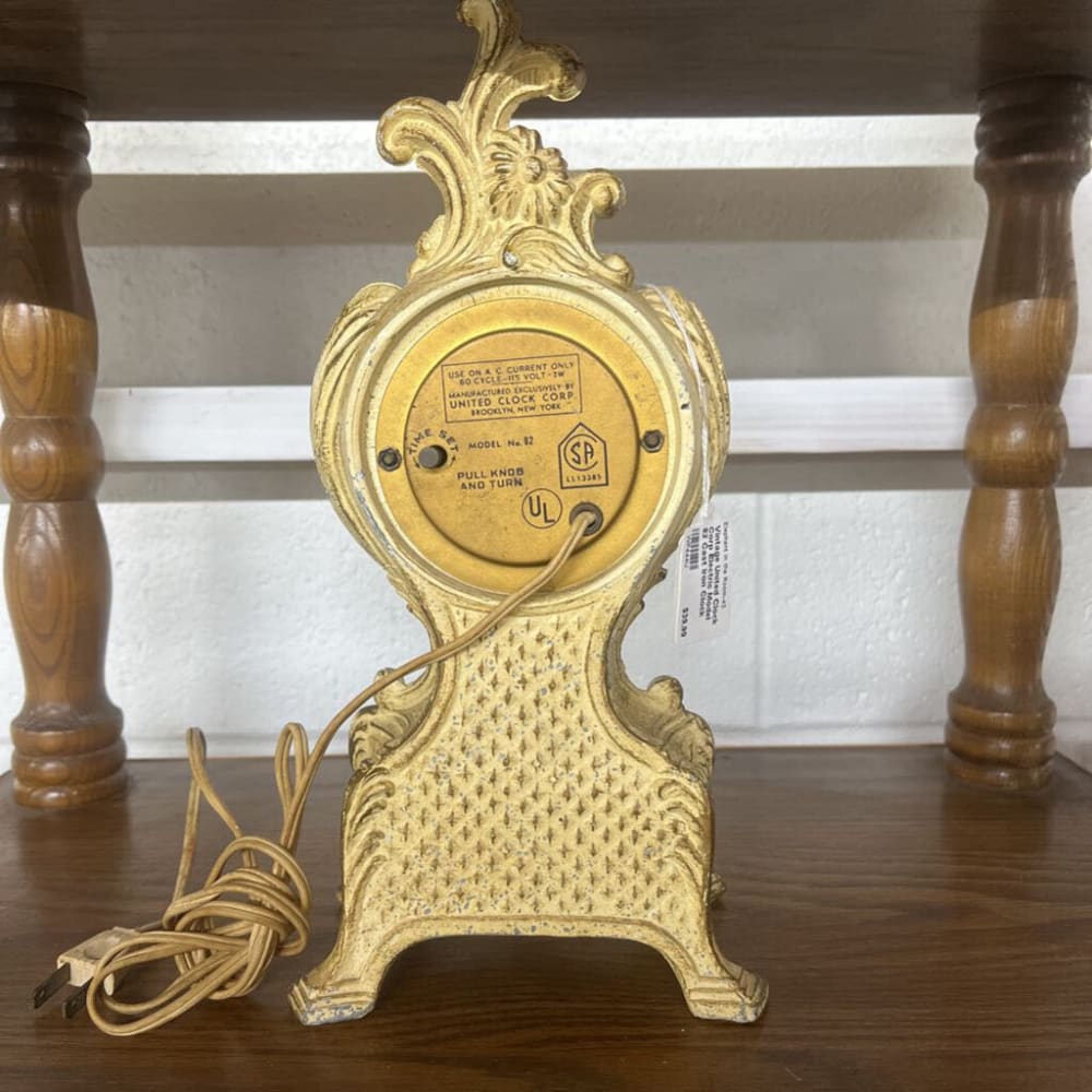 VINTAGE UNITED CLOCK CORP ELECTRIC MODEL 82 CAST IRON CLOCK