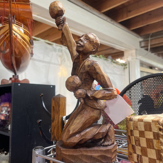 Hand carved wooden statue
