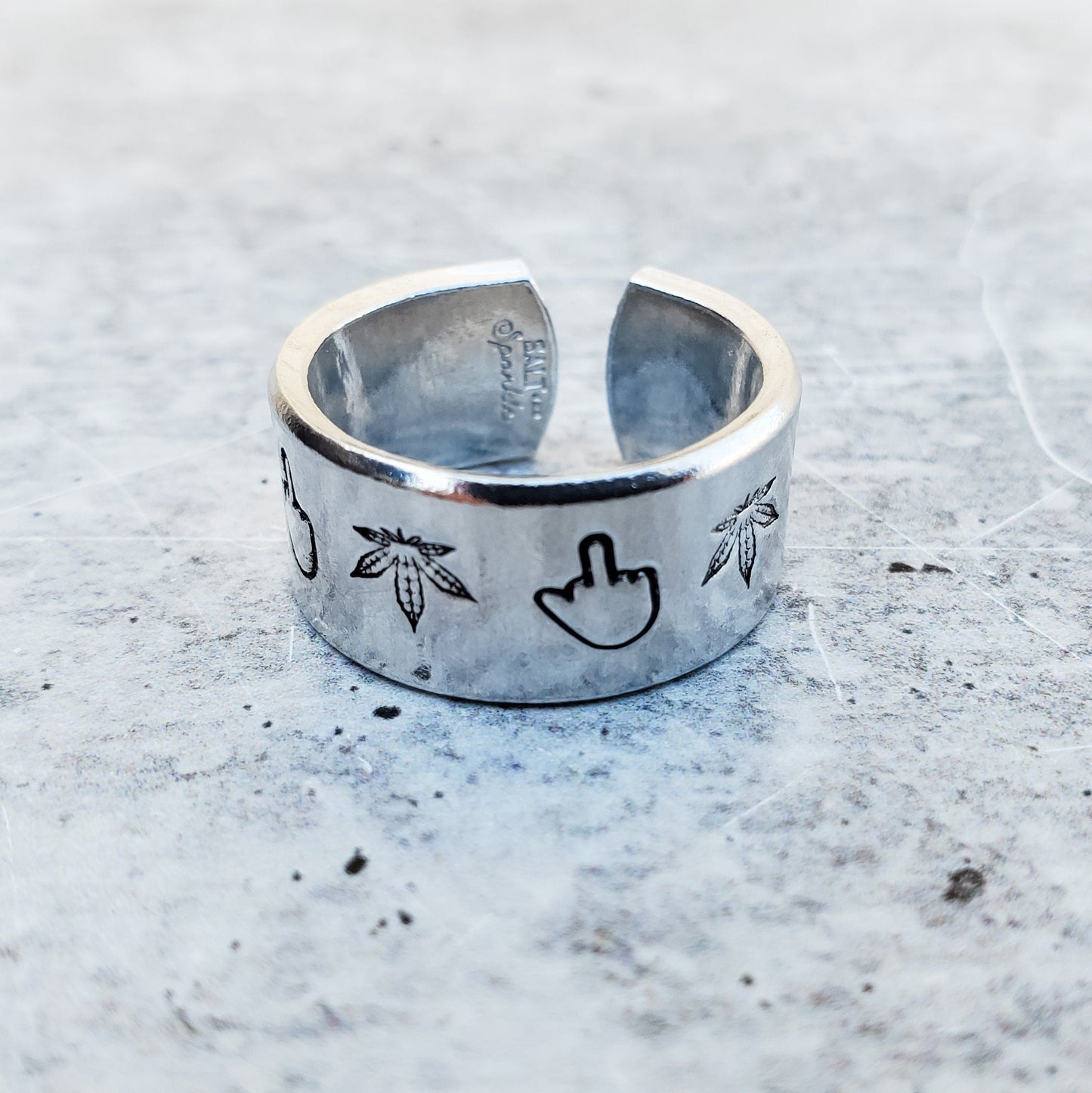 MIDDLE FINGER HEMP LEAF WIDE BAND RING