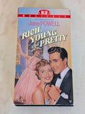 RICH, YOUNG AND PRETTY VHS NOT RATED 1951 ‧ MUSICAL/ROMANCE