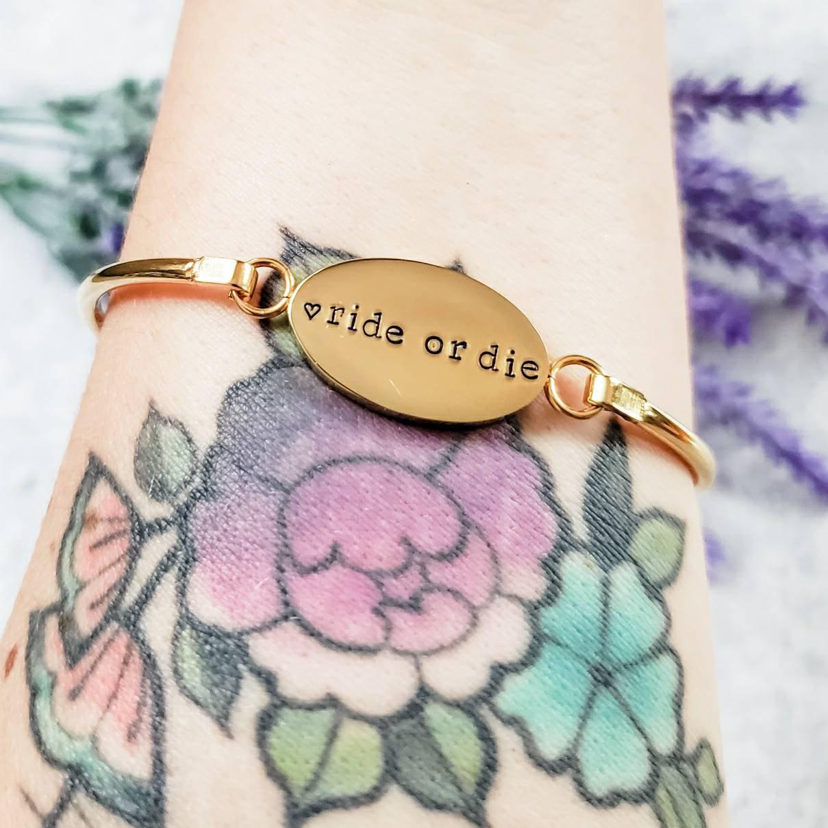 RIDE OR DIE SWING TOP BANGLE BRACELET