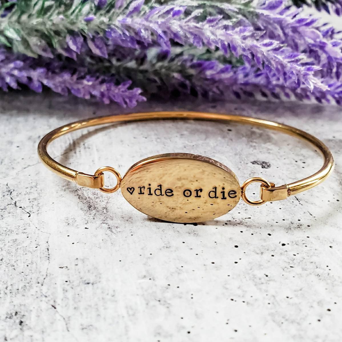 RIDE OR DIE SWING TOP BANGLE BRACELET