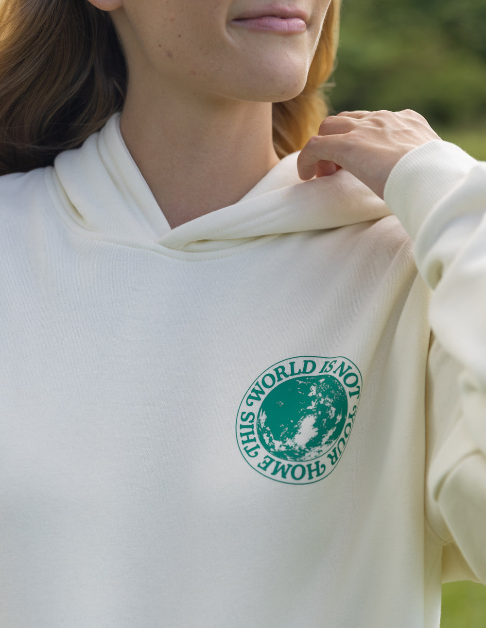 THIS WORLD IS NOT YOUR HOME UNISEX HOODIE