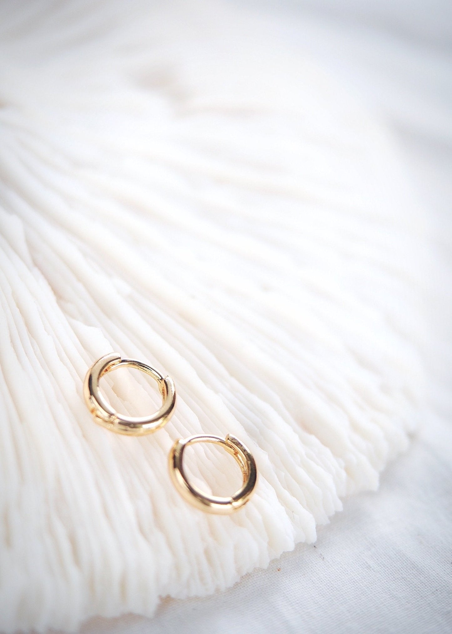 TINY GOLD HUGGIE HOOP EARRINGS - AUILI'I