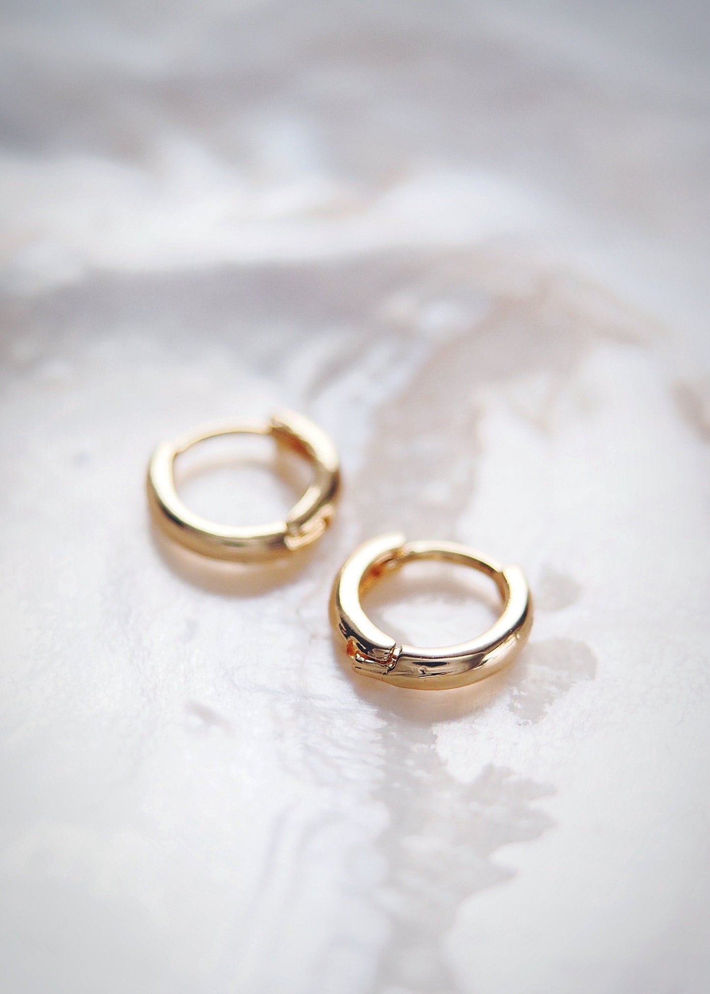 TINY GOLD HUGGIE HOOP EARRINGS - AUILI'I