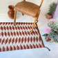 TEO RUG IN UMBER/PINK