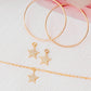 GOLD STAR HOOP EARRINGS