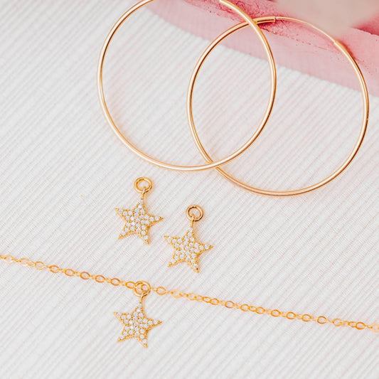 GOLD STAR HOOP EARRINGS