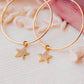 GOLD STAR HOOP EARRINGS
