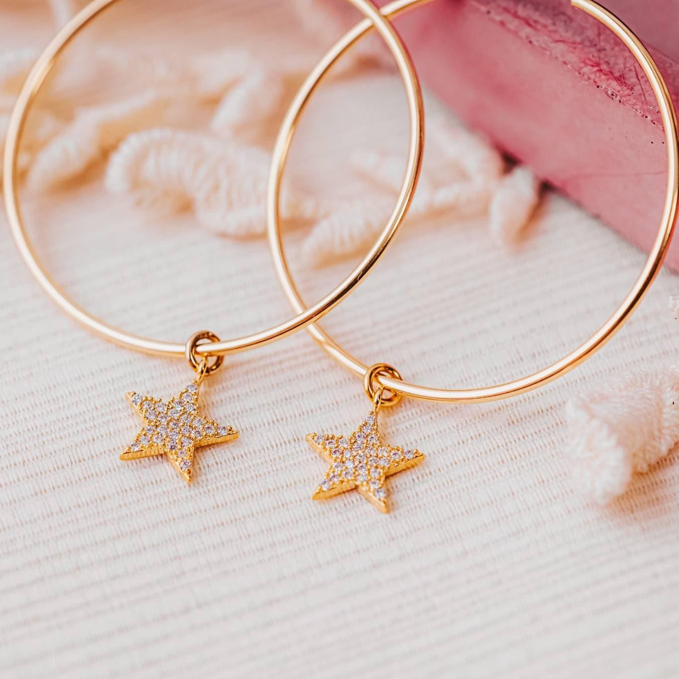 GOLD STAR HOOP EARRINGS