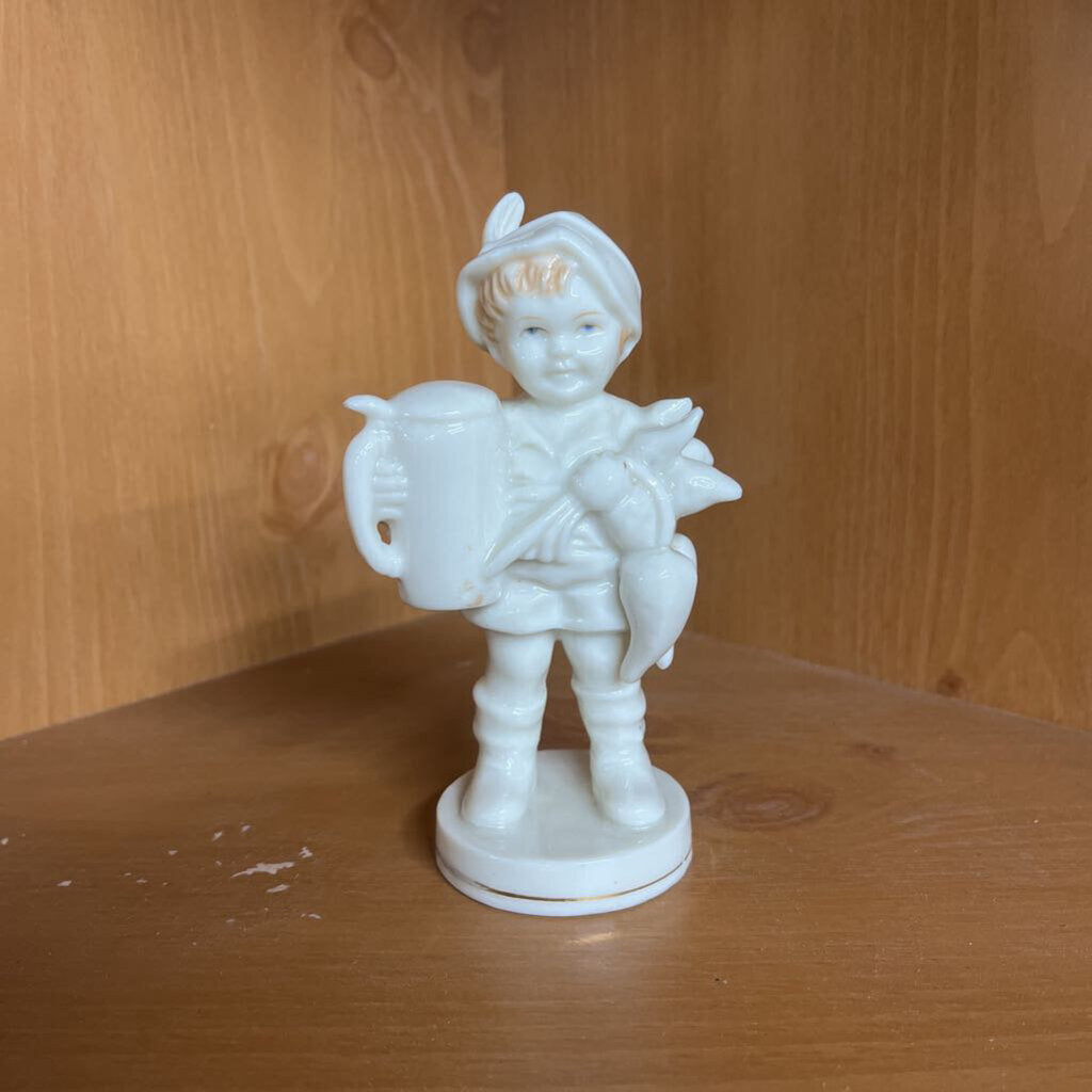 BOY WITH STEIN AND VEGETABLES IN WHITE GLAZE. JAPAN