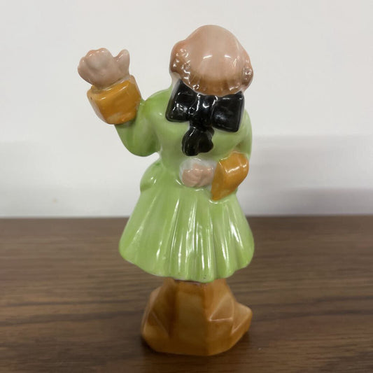 COLONIAL MAN WITH RAISED HAND IN A GREEN COAT- MADE IN JAPAN
