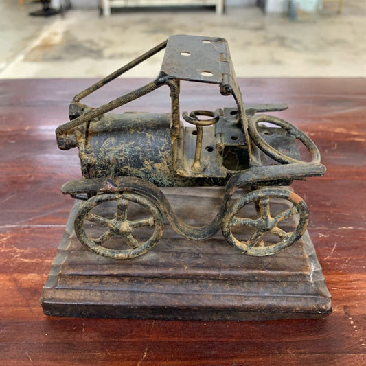 Old Iron Car on Wood