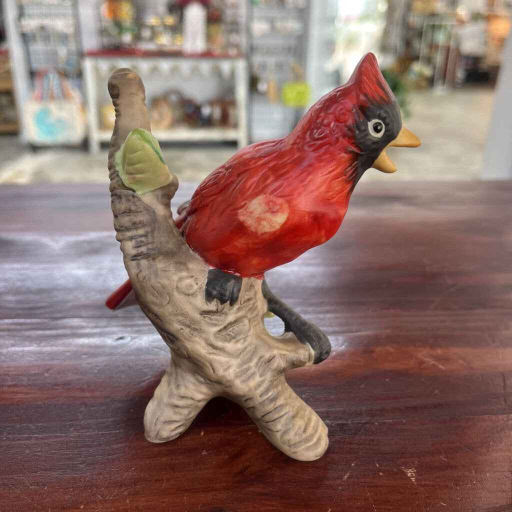 CERAMIC CARDINAL WITH YELLOW FLOWER FIGURINE