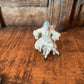 COLONIAL SITTING MAN FIGURINE