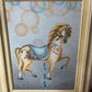 SIGNED FRAMED CAROUSEL HORSE ON CANVAS