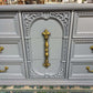 GREY BASSET 9 DRAWER WOODEN DRESSER
