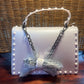 NEW GUNMETAL ON JELLY HANDBAG