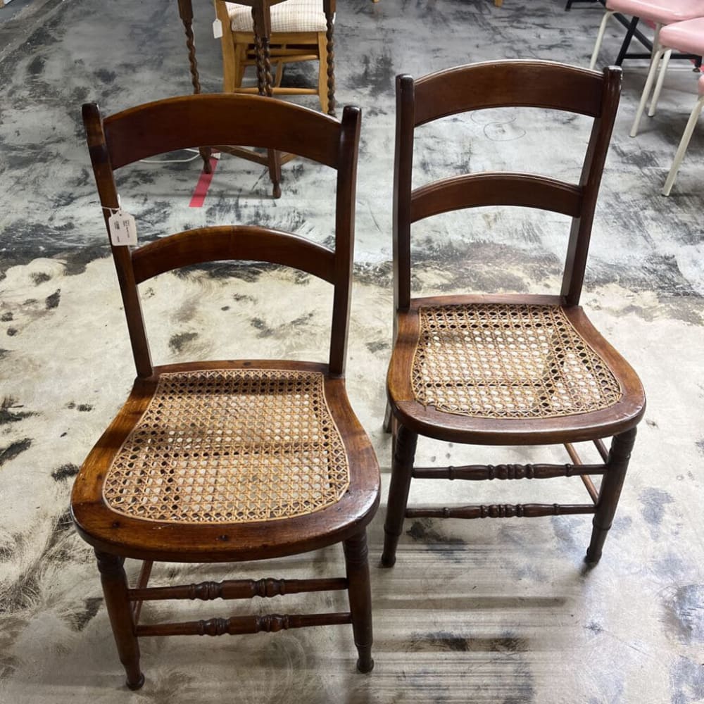 PAIR OF BROWN CANE CHAIRS