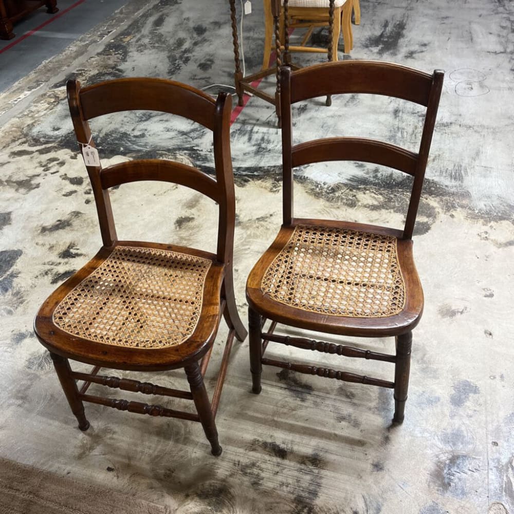 PAIR OF BROWN CANE CHAIRS