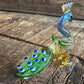 Small glass peacock