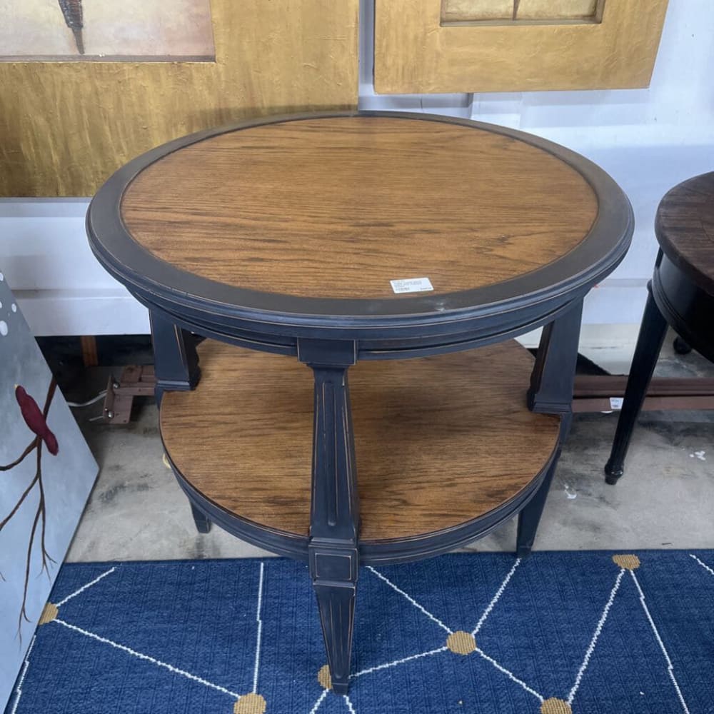 TABLE ROUND BLACK PAINT AND STAINED WOOD