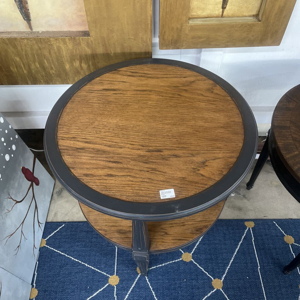 TABLE ROUND BLACK PAINT AND STAINED WOOD