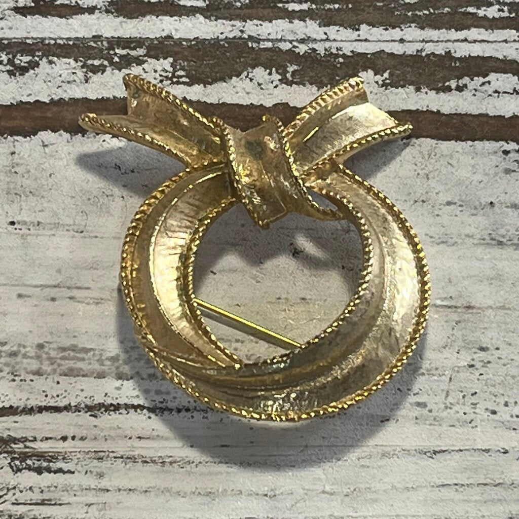 SIGNED GOLDTONE SCARF BROOCH