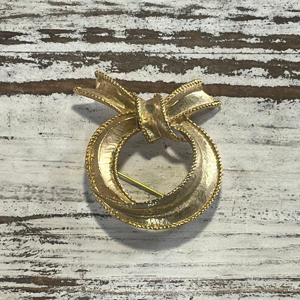 SIGNED GOLDTONE SCARF BROOCH