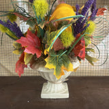 FL LO WER BAR--SMALL FLORAL ARRANGEMENT IN URN