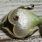 VTG GOLDTONE STYLIZED RED EYED FISH BROOCH