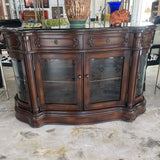 BOWFRONT BUFFET STONE TOP GLASS DOORS