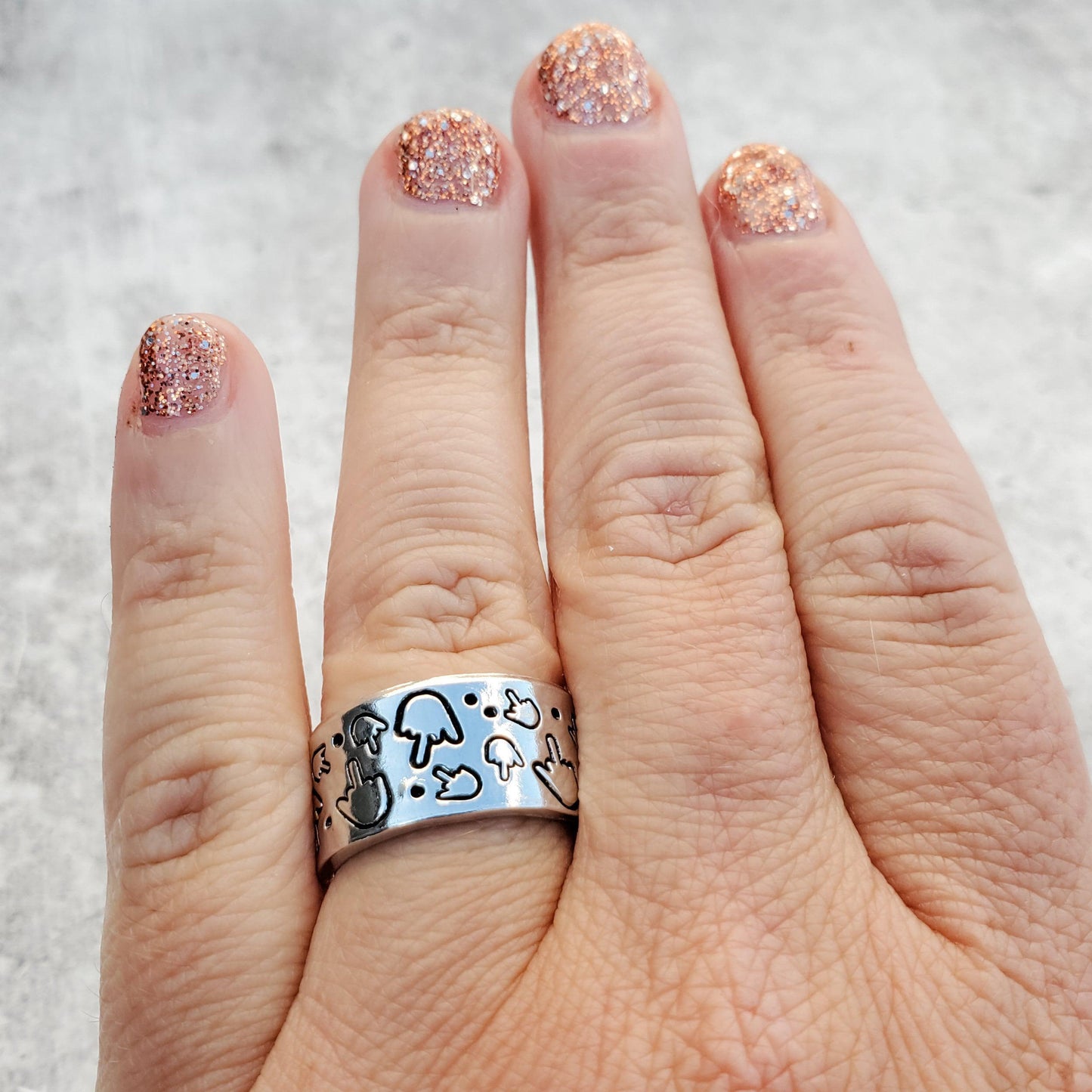 MIDDLE FINGER PARTY RING