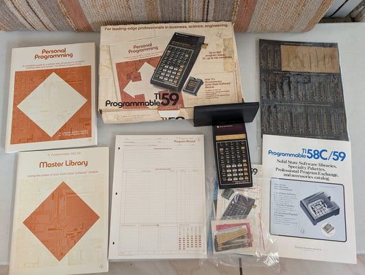 TEXAS INSTRUMENTS TI PROGRAMMABLE 59 CALCULATOR CASE & MASTER MODULE/LIBRARY AND MANUALS