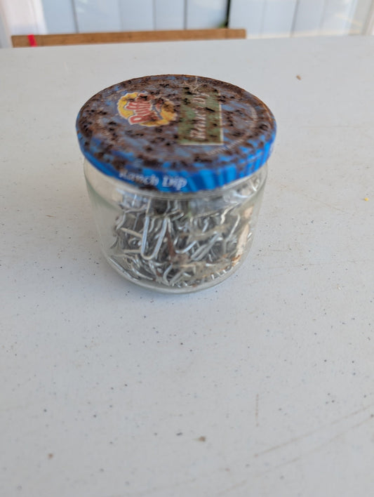 GLASS JAR - VINTAGE WITH VINTAGE FENCING STAPLES