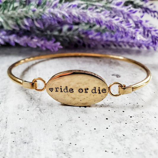 RIDE OR DIE SWING TOP BANGLE BRACELET