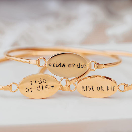 RIDE OR DIE SWING TOP BANGLE BRACELET