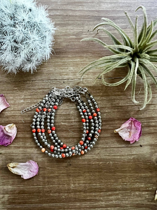 Fashion Pearl Bracelet With a bit of Orange