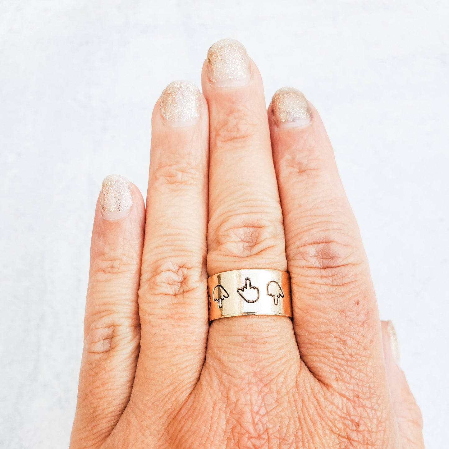 GOLD MIDDLE FINGER RING