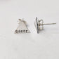 QUEER SILVER STUD EARRINGS