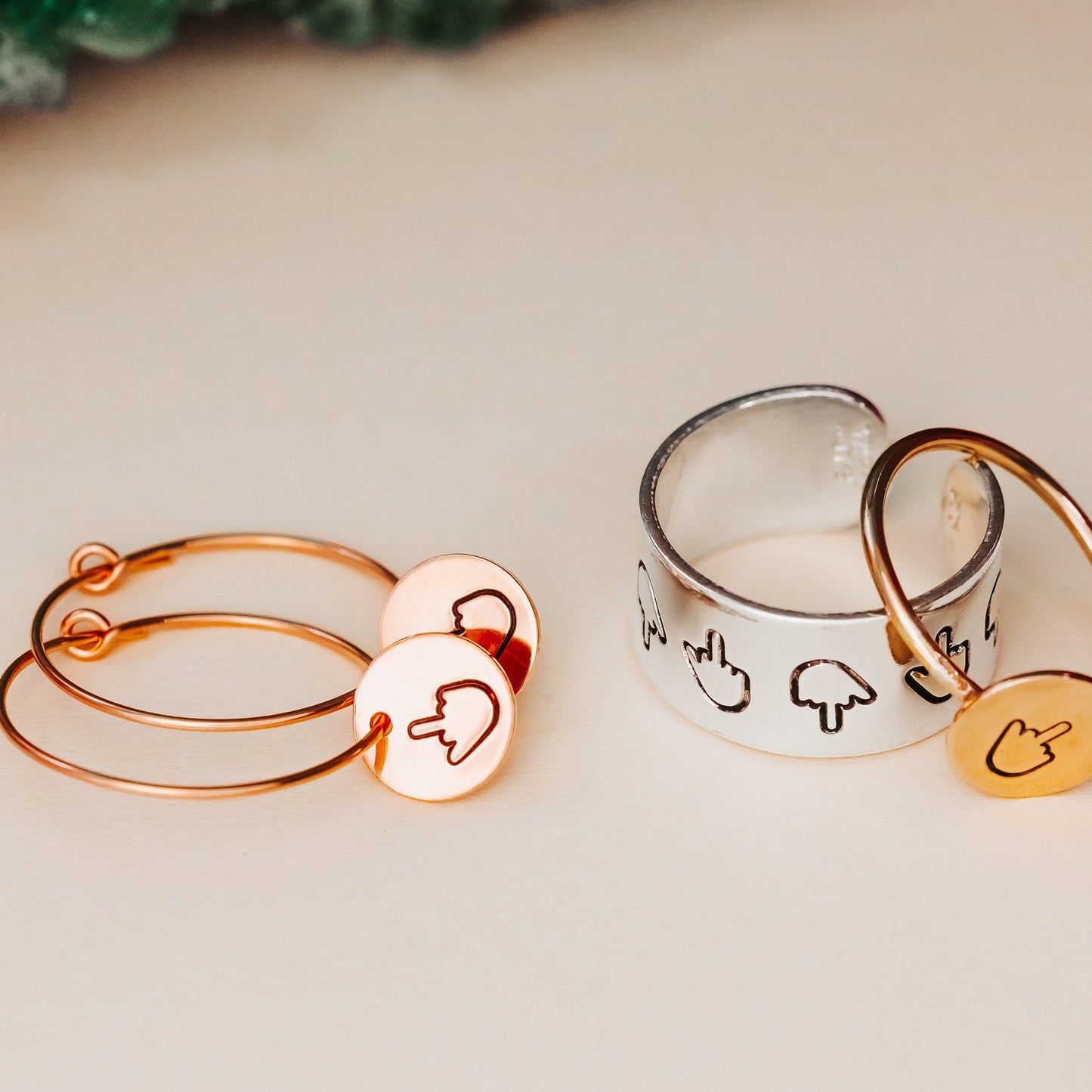 MIDDLE FINGER DAINTY HOOP EARRINGS