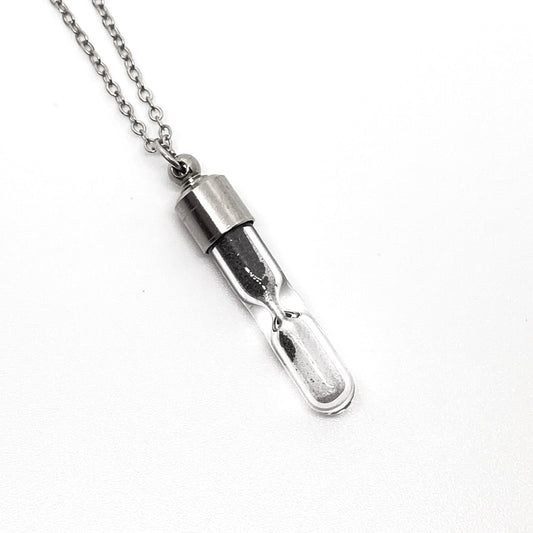 SPACE TIME HOURGLASS NECKLACE WITH METEORITE DUST