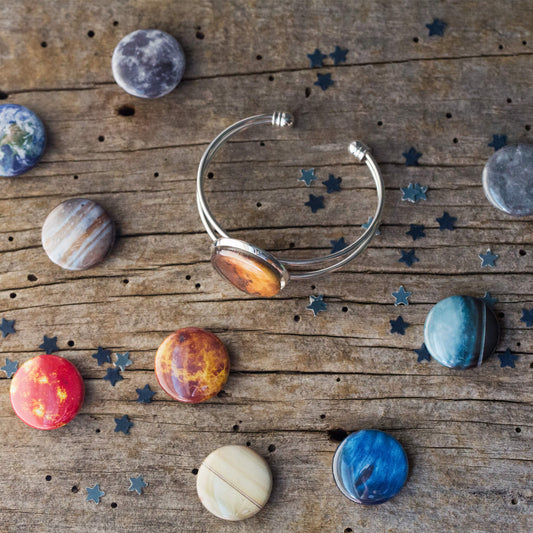 INTERCHANGEABLE SOLAR SYSTEM CUFF BRACELET