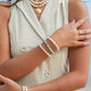 STRETCHY PEARL BRACELET WITH GOLD SHELL ACCENT - NANEA